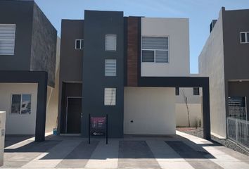 Casa en fraccionamiento en  Belisa Residencial Etapa 6, Flor De Vainilla, Parcelas Ejido Jesús Carranza, Juárez, Chihuahua, México